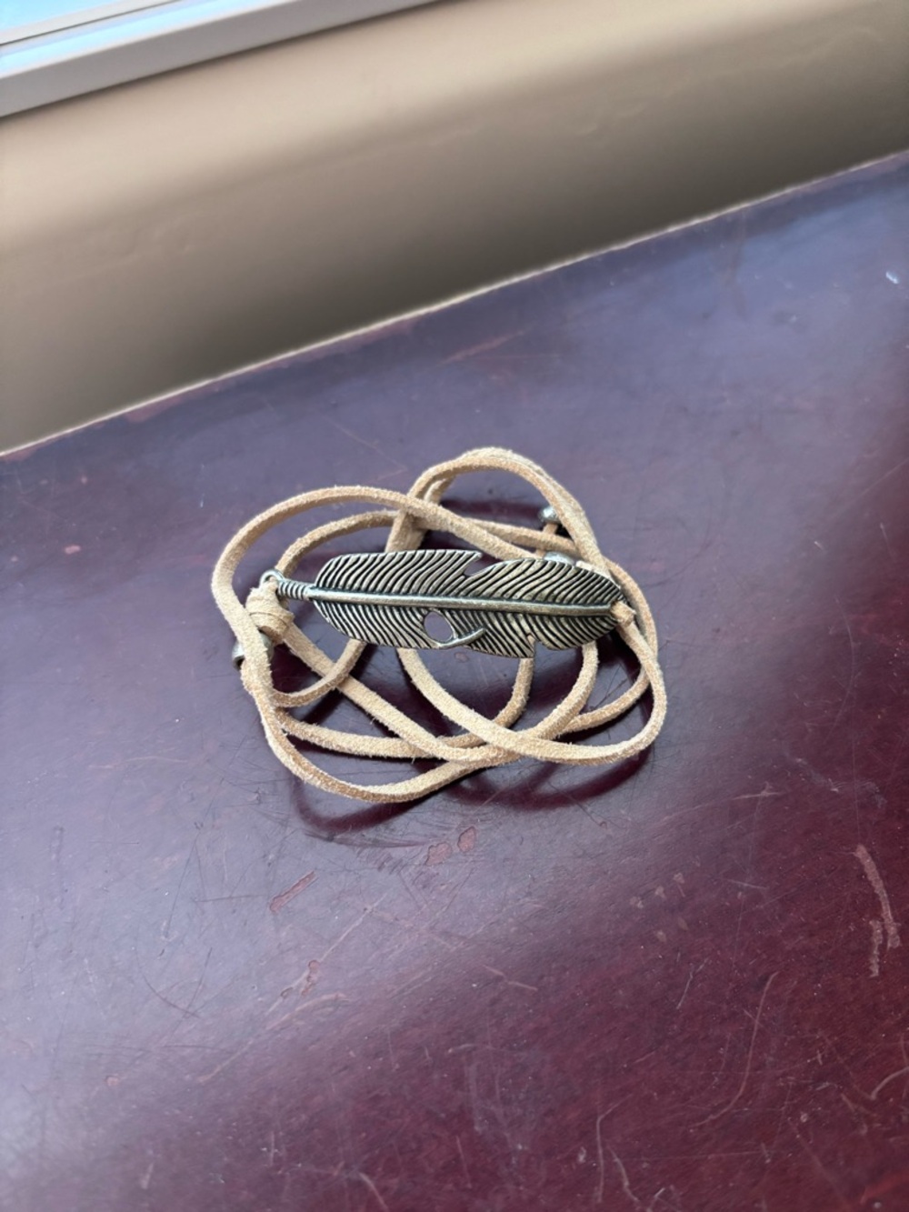 Feather Pendant Wrap Bracelet in Antique Silver with Taupe Suede Cord